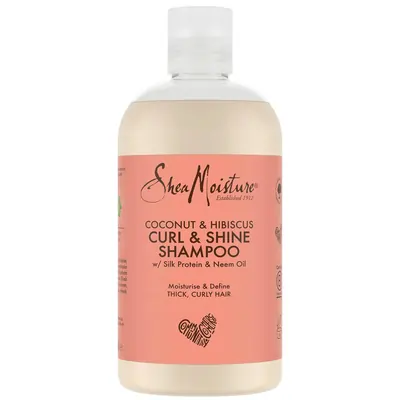 A tied FEMMENORDIC's choice in the Shea Moisture vs OGX shampoo comparison, the Shea Moisture Coconut & Hibiscus Curl & Shine Shampoo